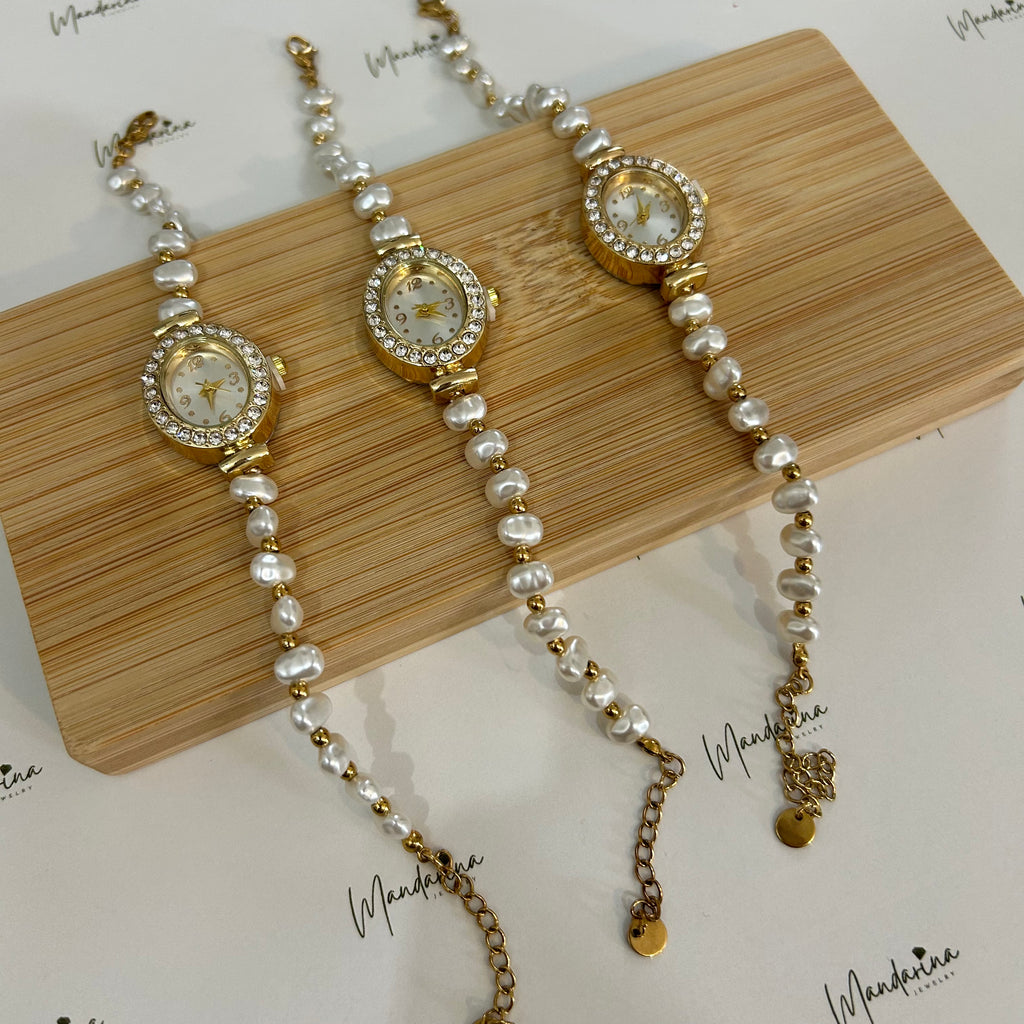 Reloj golden pearl